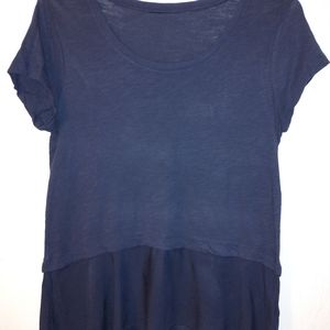 Navy blue blouse with a settle ruffle